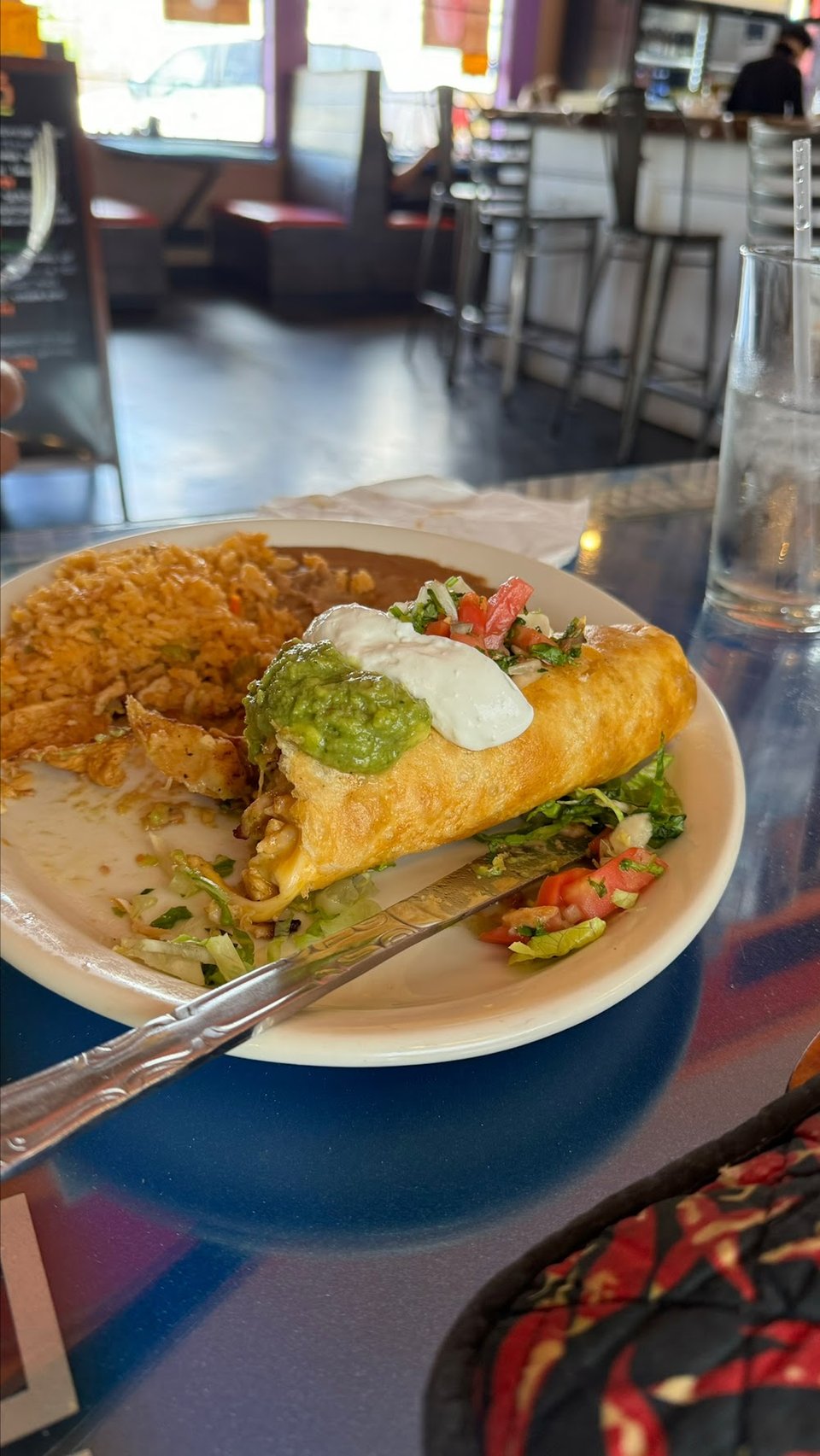 Printed menu with omelettes, fajitas, and enchiladas.