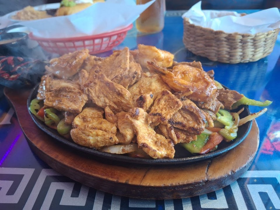 Food menu showing seafood, chicken, and kids' plates.
